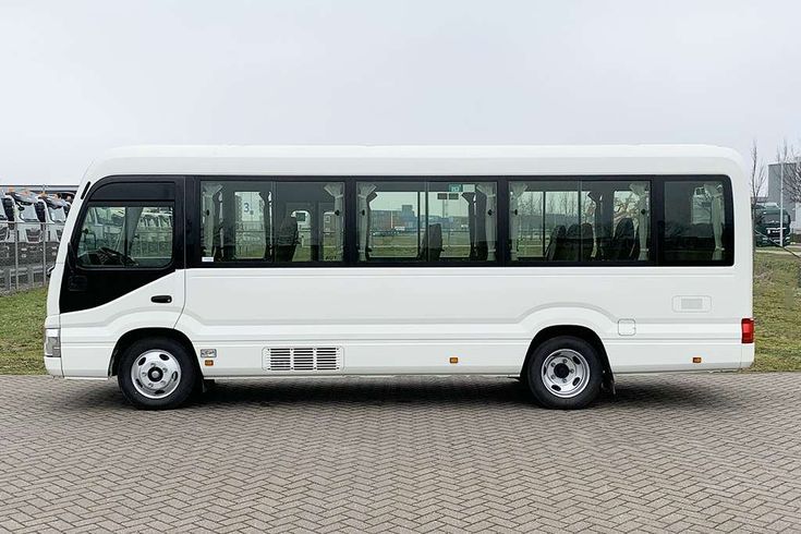 Toyota Coaster bus hire Uganda – mid-size group transport